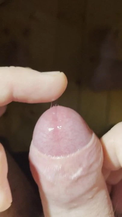 Pre cum play with uncut cock