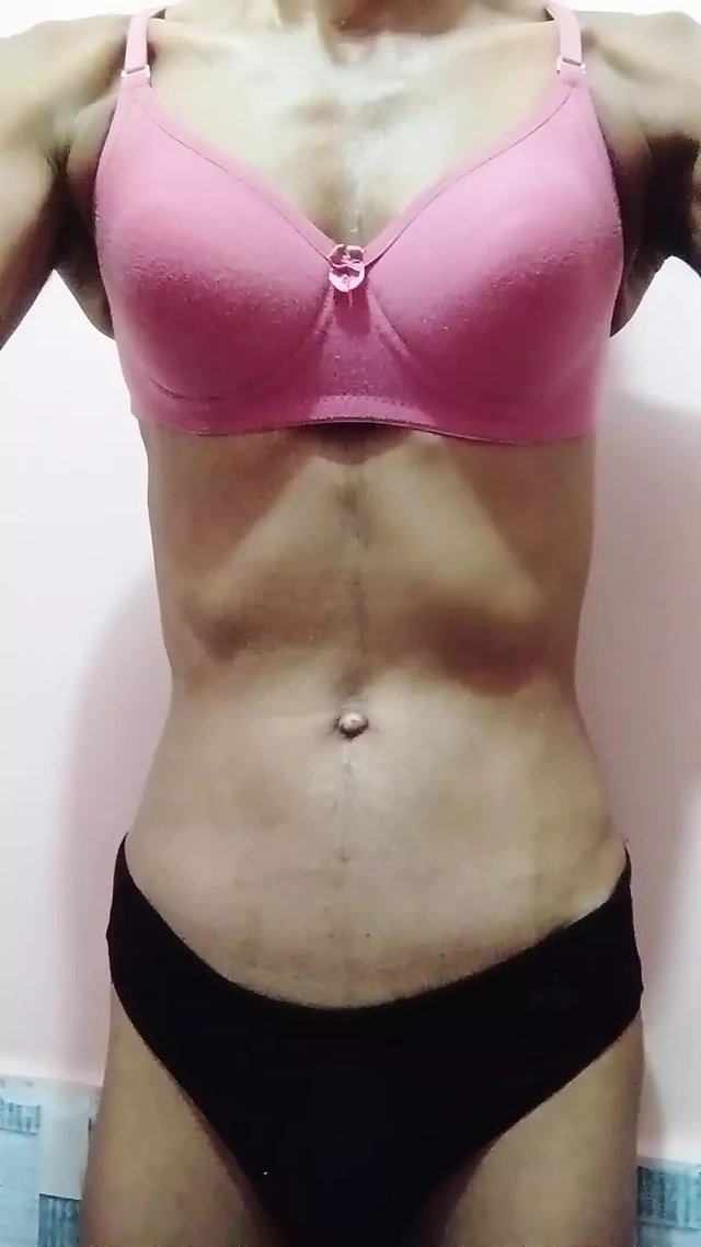 Sissy wearing pink bra and red panty