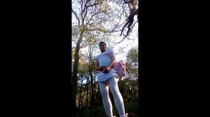 Sissy Hugh thompson walksing in the woods and being naughty
