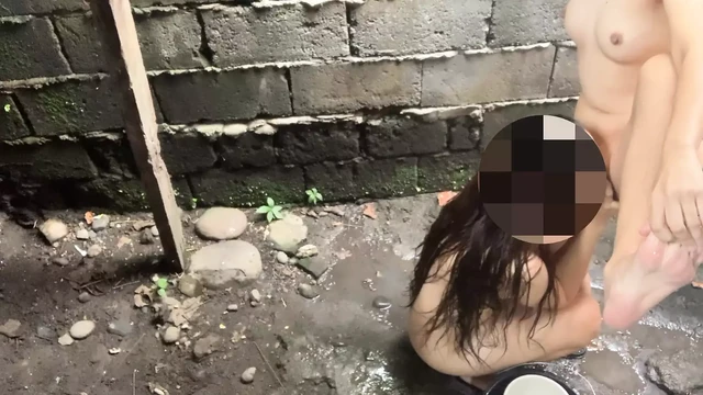 taking a bath outside with my neighbor