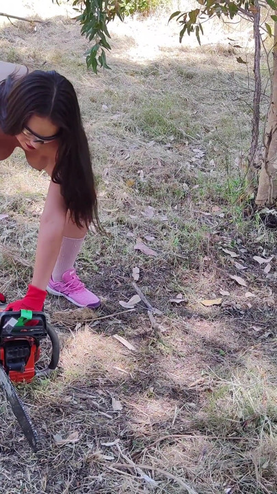 Gasoline Chainsw Naked Girl Cutting Branches