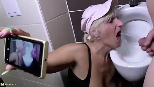Perverted step moms piss and take cocks in toilet
