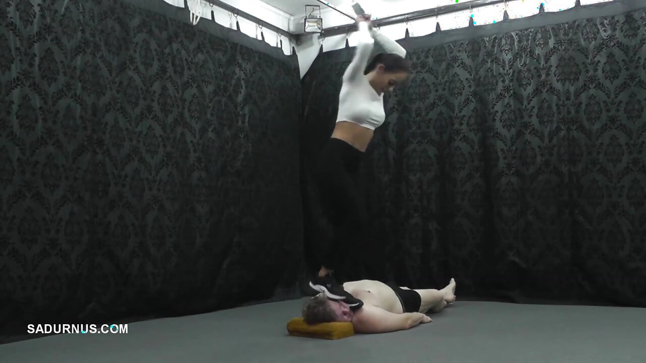 Under Nomi's Black Nike Sneakers
