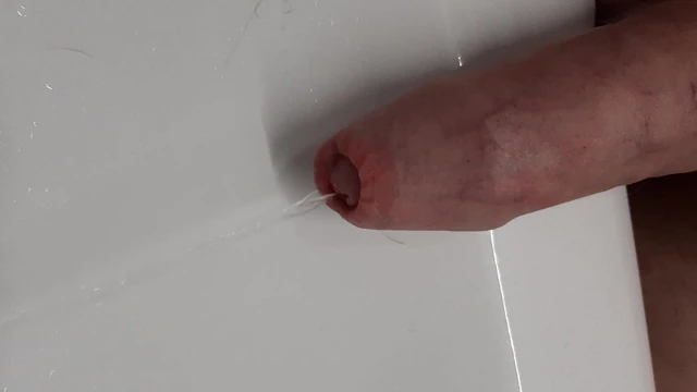peeing with pumped dick