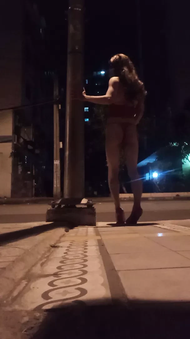 Slut in high heels and sexy dress