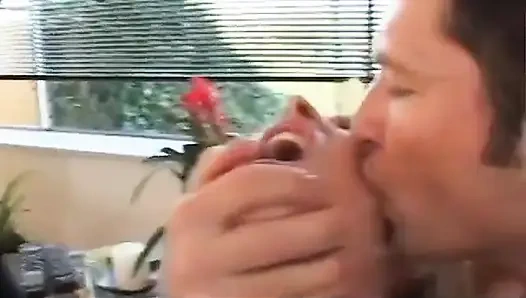 Horny blonde with huge tits gets hot threesome action indoors