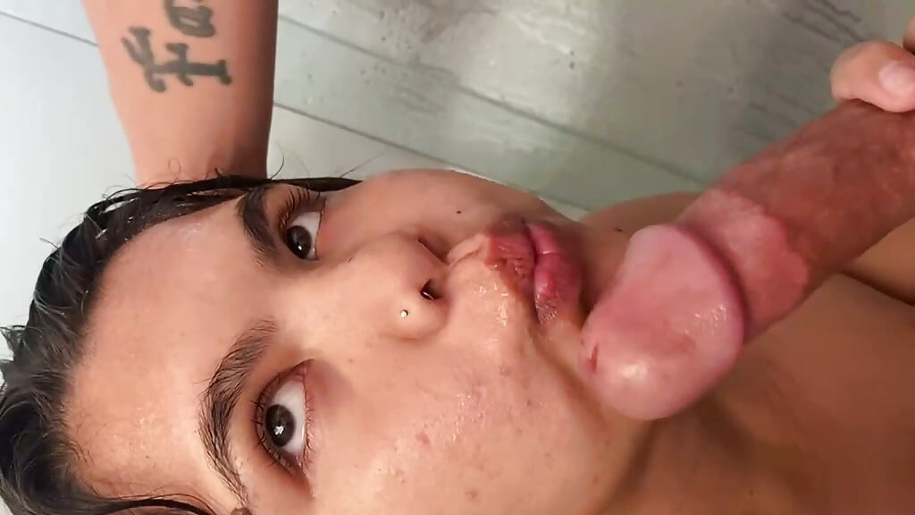 Little doing oral in the bath on her husband
