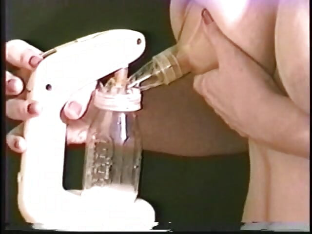 Hot girl squeezes her big nipples to squirt out milk