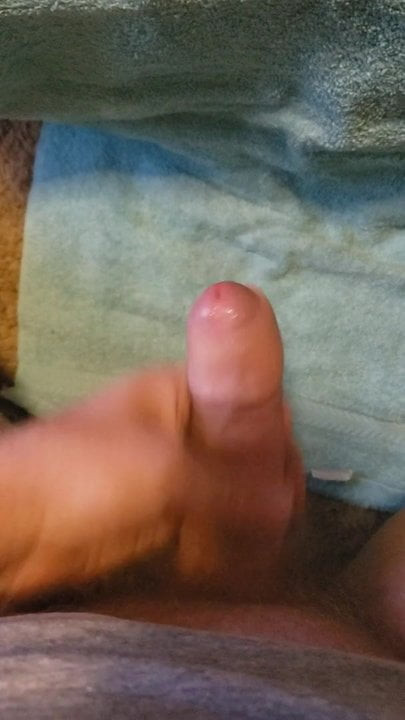 Masturbating