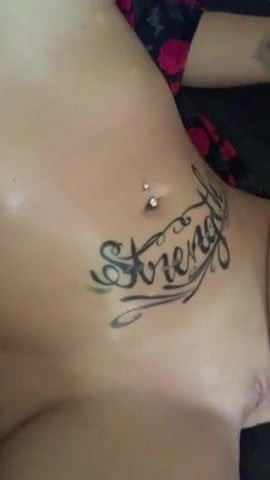 Tattooed chick masturbates