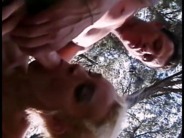 Young blonde tranny Claudia Hunter in red latex jackboots enjoys getting her butt nailed in the forest