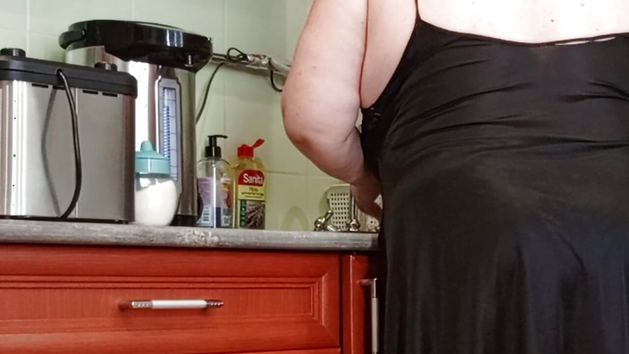 I came into the kitchen and flashed my cock to my neighbor and she sucks and jerks it off until I cum