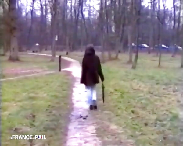 A Young Woman in Full Rupture Approached by Our Casteur in a Park.