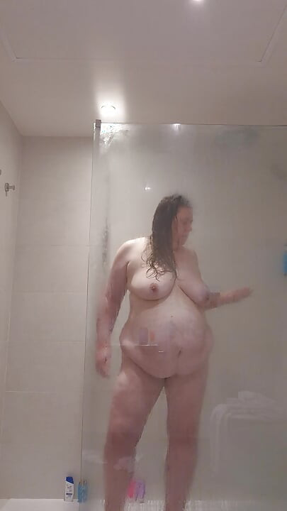 Curvy MILF Takes Shower Flashing All