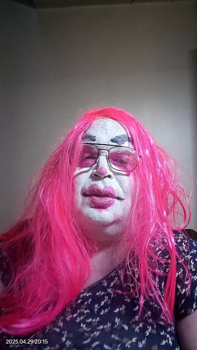 TV clown slut smoking a cigarillo and talking dirty