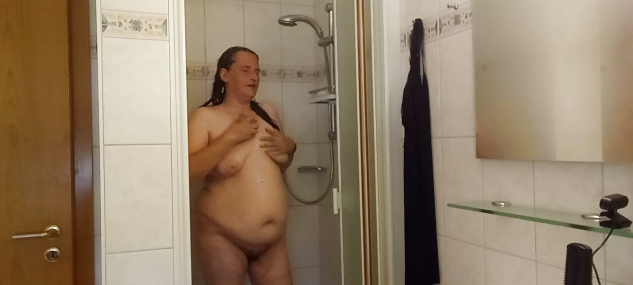 Chubby mature woman in the shower - soft belly - part 2