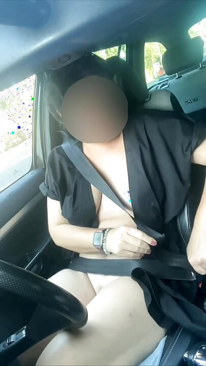 Naked sexy MILF in a car