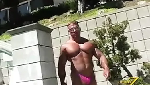 Muscle stud by the pool