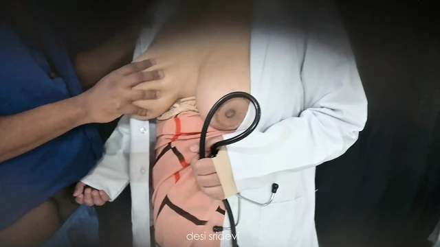Sexy doctor checking patient dick