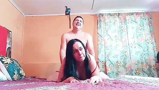 Curvy Latina in a red dress gets a good fucking in doggy style.