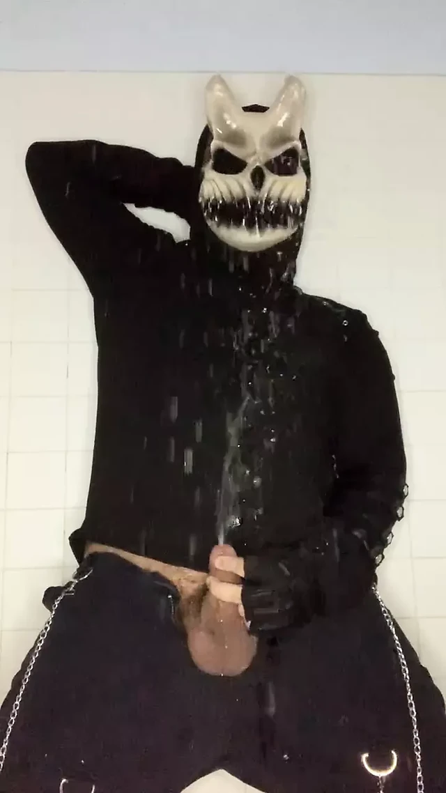 demon soaking himself in a fountain of piss