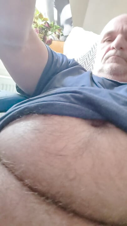 Grandpa Sits in Armchair and Plays with His Little Cock with a Vibrator Around His Little Cock