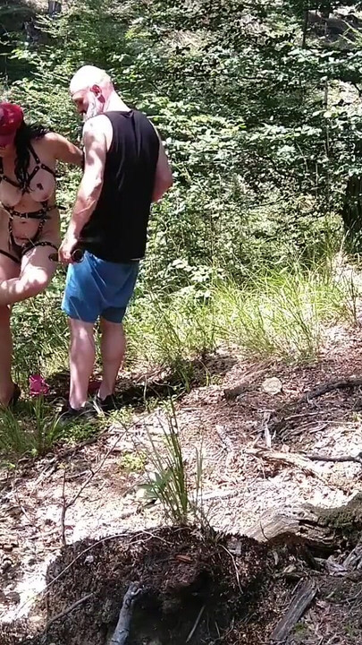 Iconic moment from "Milf woman with big tits jerking fat dick in the woods"