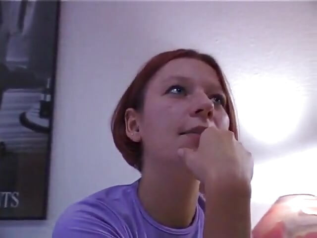 Redhead girl rubs and fingers her wet twat