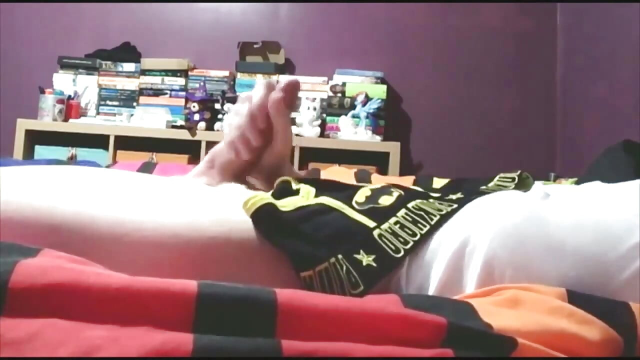 Sammy Andrews cumming on black superhero underwear