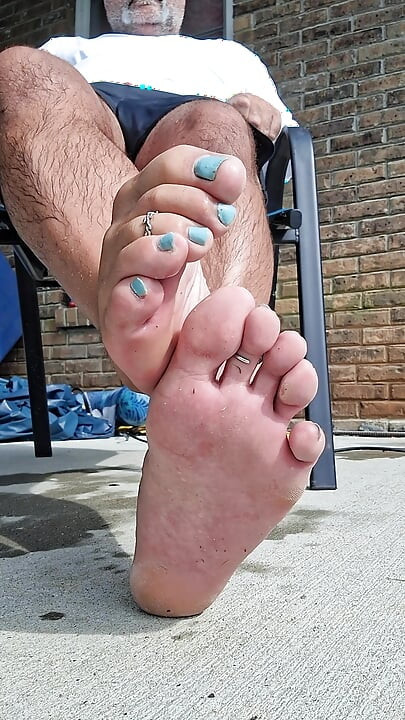 Posing my wet legs and feet by the pool before I jerk off and cum