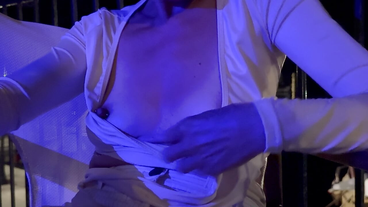 My beautiful breasts and pierced nipples are exposed in a night out bar by the sea