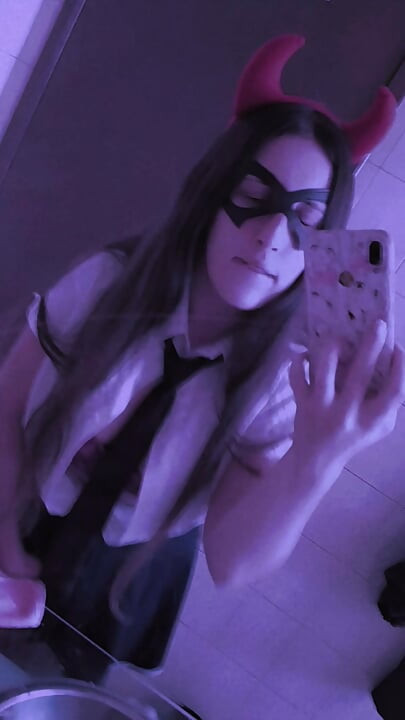 Just a cute naughty student, making a striptease and showing her tongue out begging for u put your hard cock on my mouth