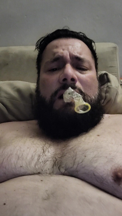 MASTURBATING WITH A CONDOM IN MY MOUTH