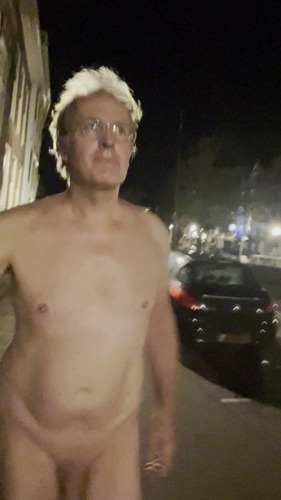 Nuaked walk in town - nudist exhibitionist