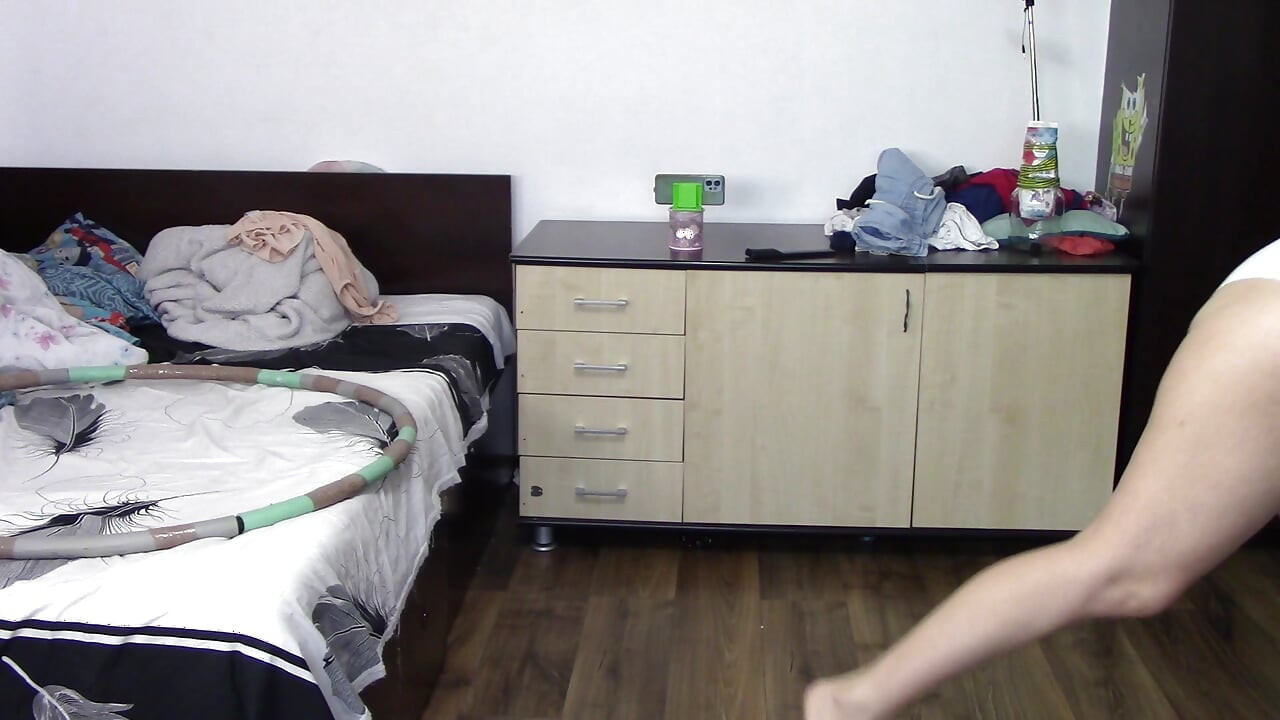 Sexy wife trains naked at home. Sexy brunette tries on stockings, hairy pussy, big ass, big tits.