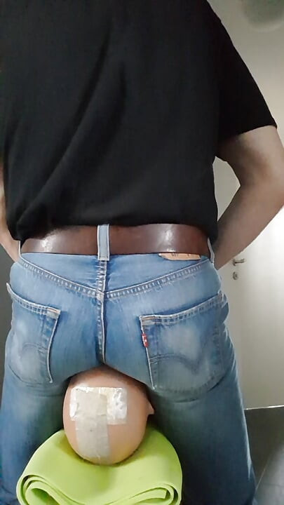My jeans-butt riding the face of my sitting-doll