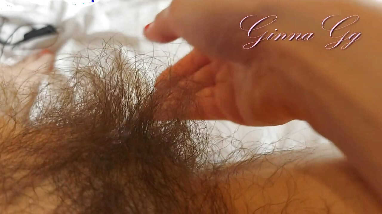 An Extremely Hairy Brunette Finger Masturbates a Pussy From Which Big Labia Stick Out MILF Ginnagg