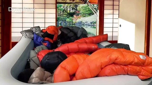 Humping 20 Down Puffer Jackets in an Inflatable Pool