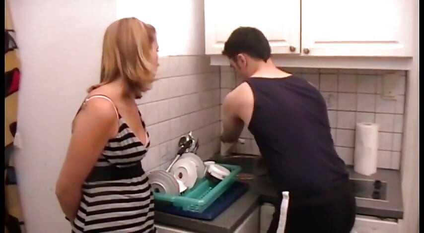 Poor Dude Must Clean Kitchen on Order of His Mistress