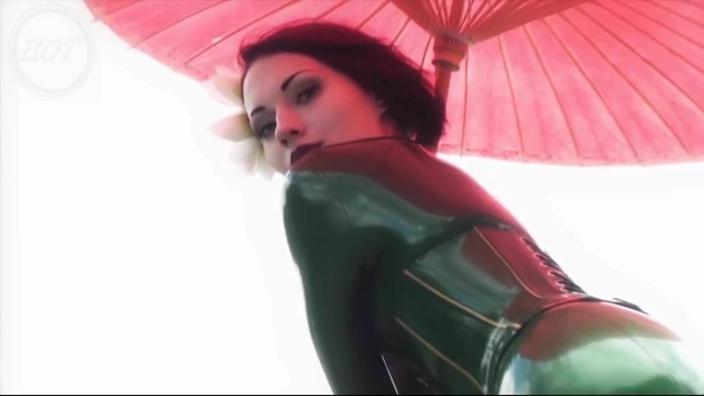 Beautiful girl modelling green catsuit