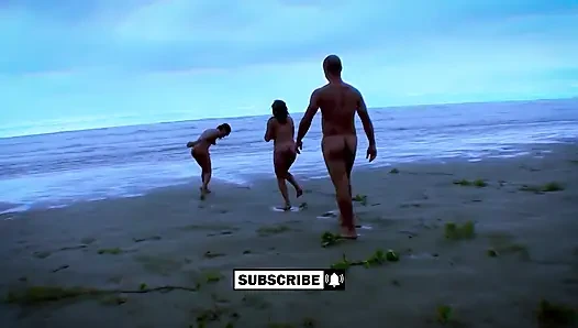 Big ass on the beach with several naked women having sex