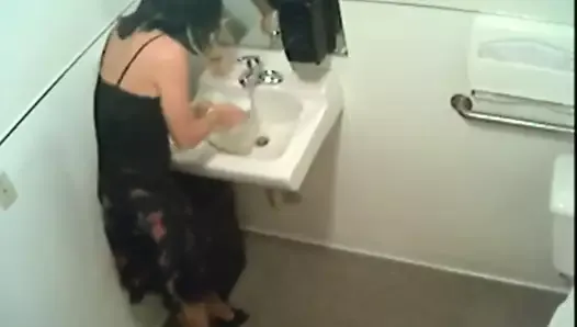 Kinky amateur pissing in restroom