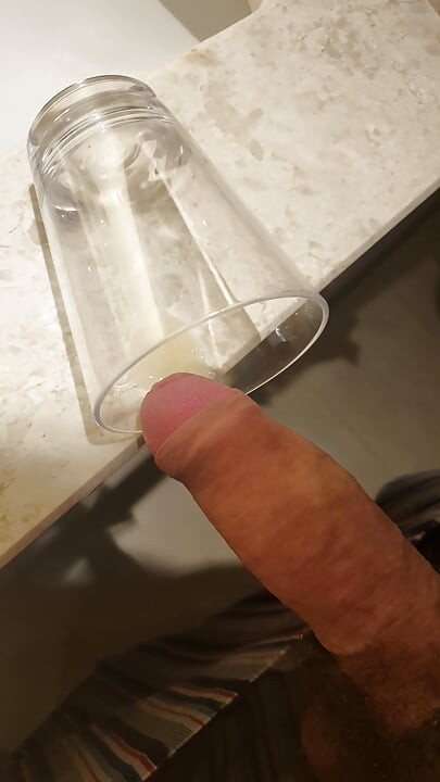 Another cumshot in a cup