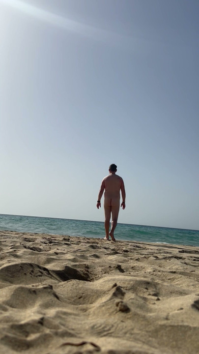 Running naked on the beach