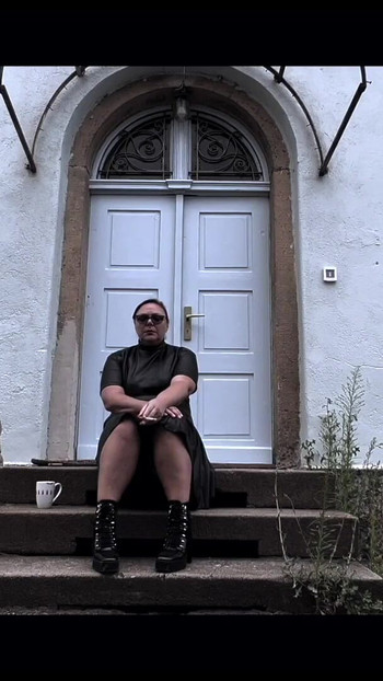 Captivating moment from "Dominatrix Mistress April - A Day at the Spa"