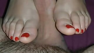 Wanks with varnished fingers, red varnished feet and finished in footjob with cum tasting on toes