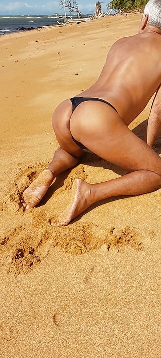 Ladysilva on the beach in panties showing off her hot ass