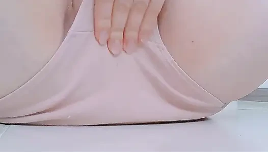 beneath her pink panties, wet from her pussy with fingers inside