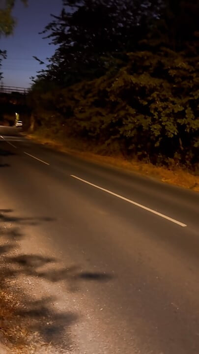Undressing in view of traffic and walking naked in the road