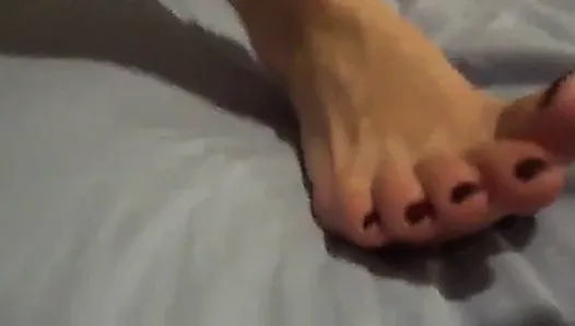 Suck on my toes while I fuck myself.....